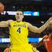 Michigan freshman Mitch McGary moves the ball around Syracuse junior C.J. Fair during the first half at the Final Four in Atlanta on Saturday, April 6, 2013. Melanie Maxwell I AnnArbor.com